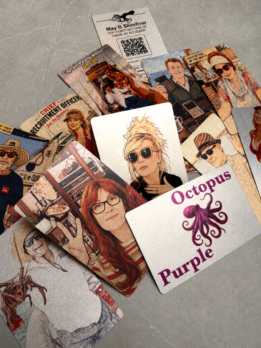 A spread of Purple Octopus metal cards showing the range of designs